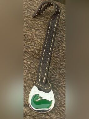 Dooney & Bourke vintage “Duck" key fob/bag hangtag black leather